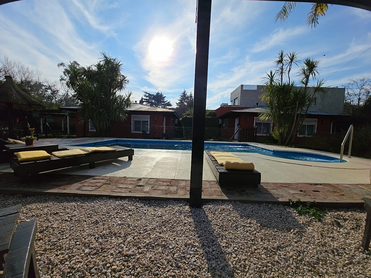 OPORTUNIDAD DE INVERSION, COMPLEJO DE 5 CABAÑAS A METROS DE LA LAGUNA + POSIBILIDAD DE CASA LINDERA